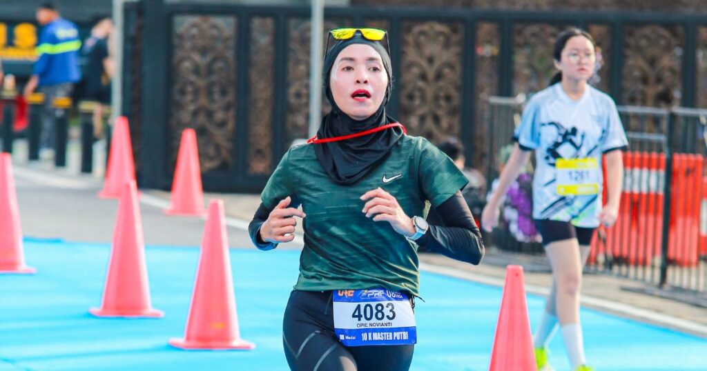 Profil Opie Novianti - Marathon yang Menguji Mental